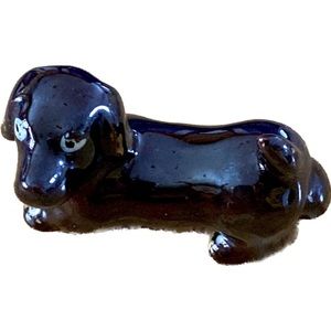 Antique ceramic dachshund wiener dog looking puppy dog